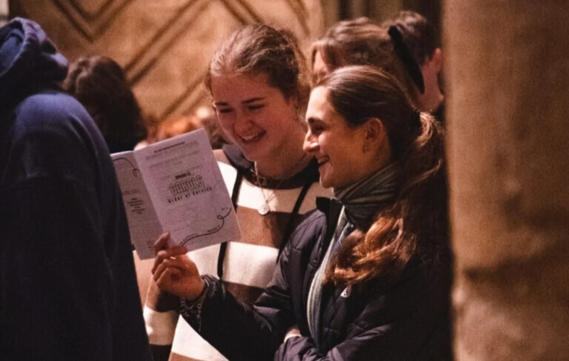 Congregation Members sharing booklet
